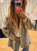 Manteau fausse fourrure léopard des neiges