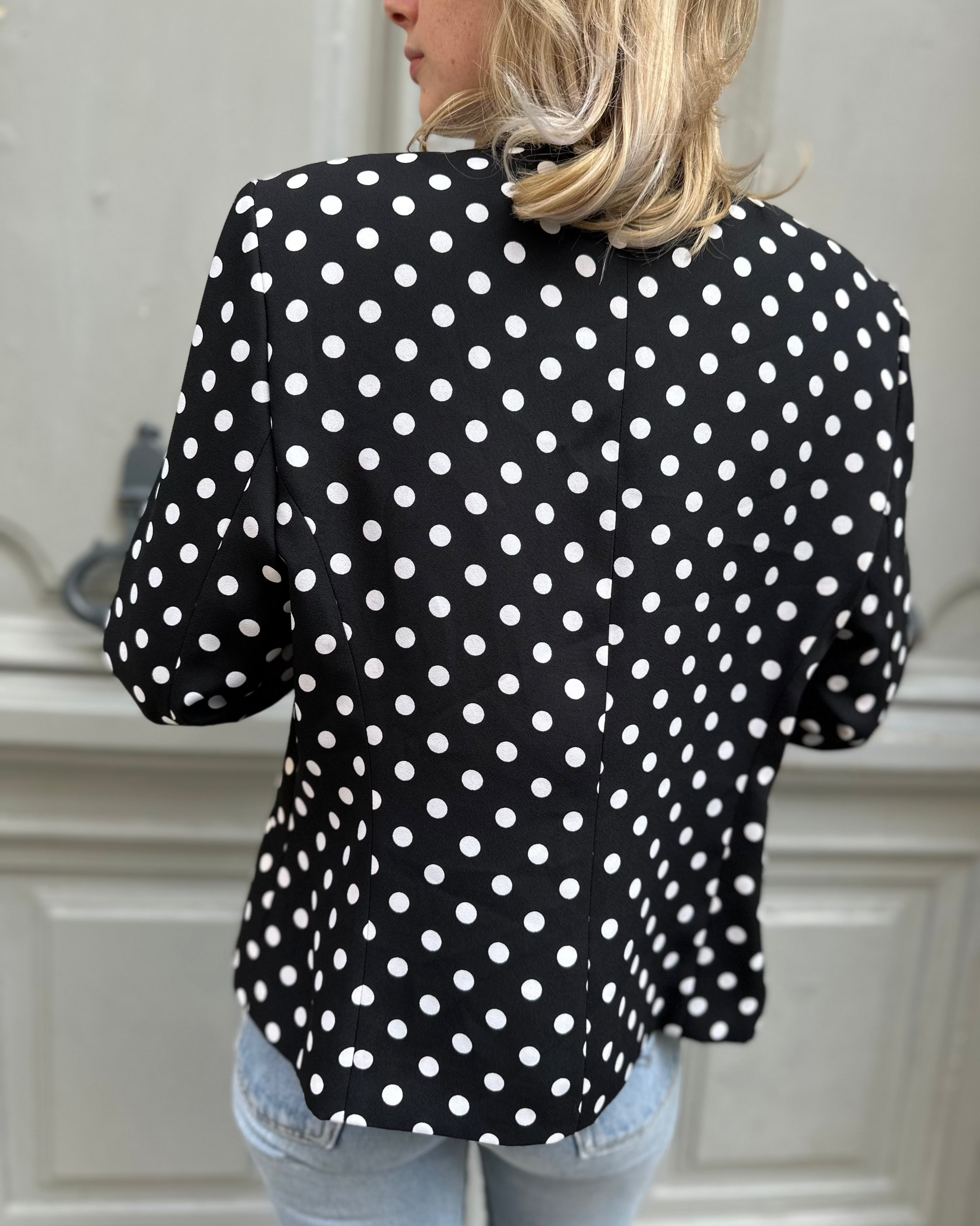 Veste noire à pois