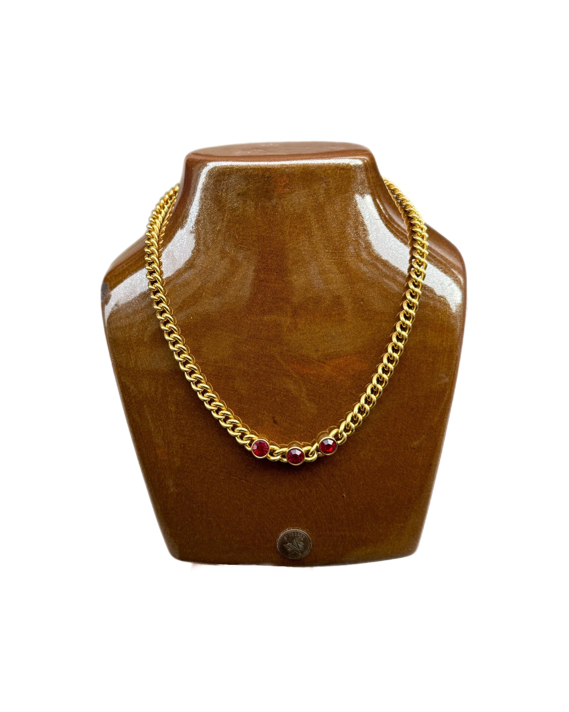Collier doré Monet à pierres rouges