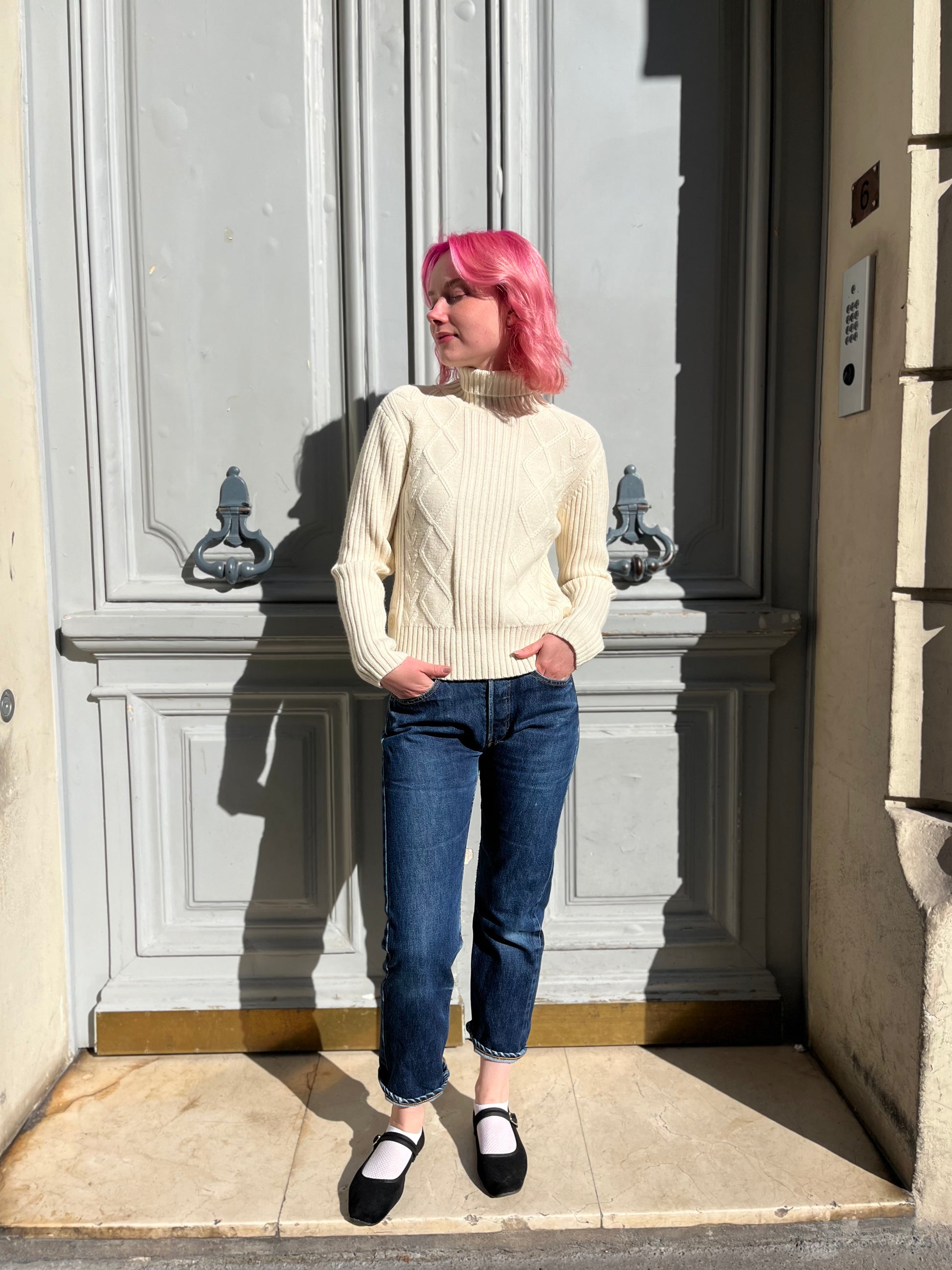 Pull écru en maille torsadée