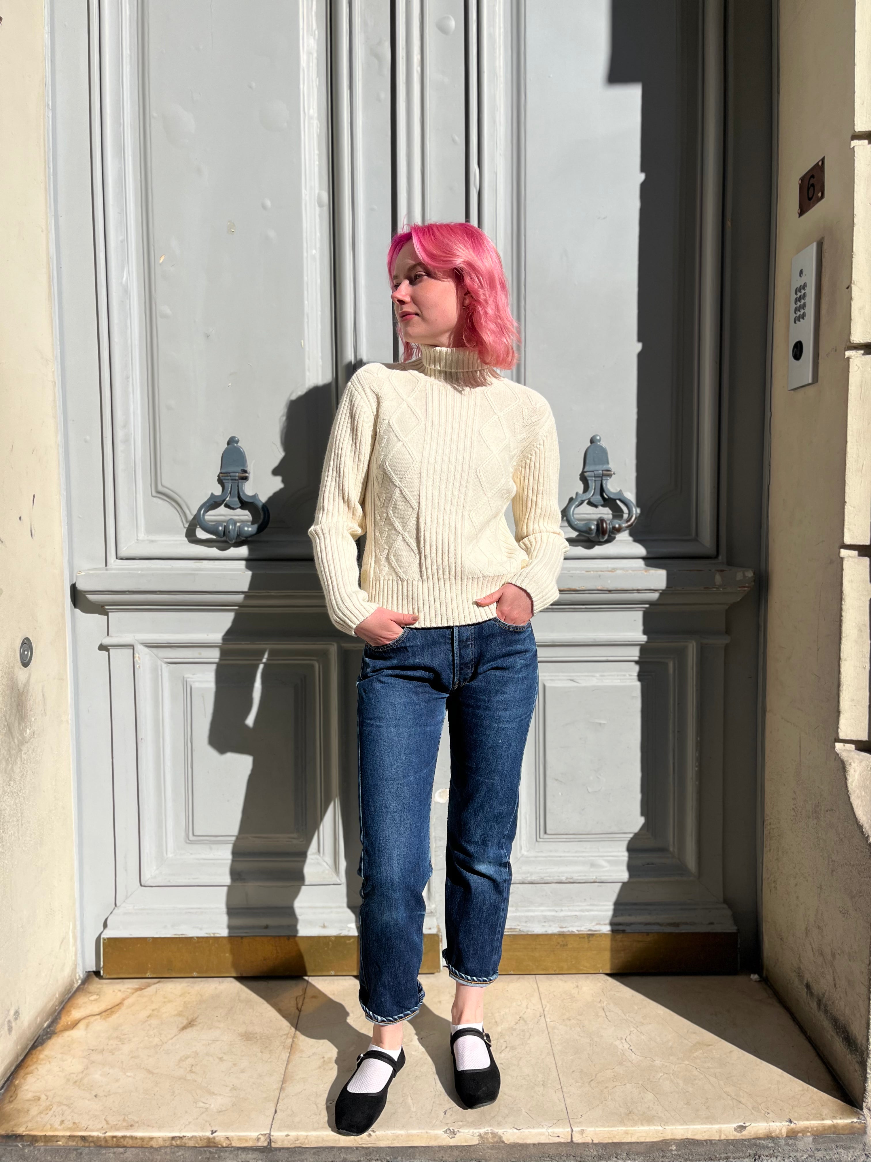 Pull écru en maille torsadée