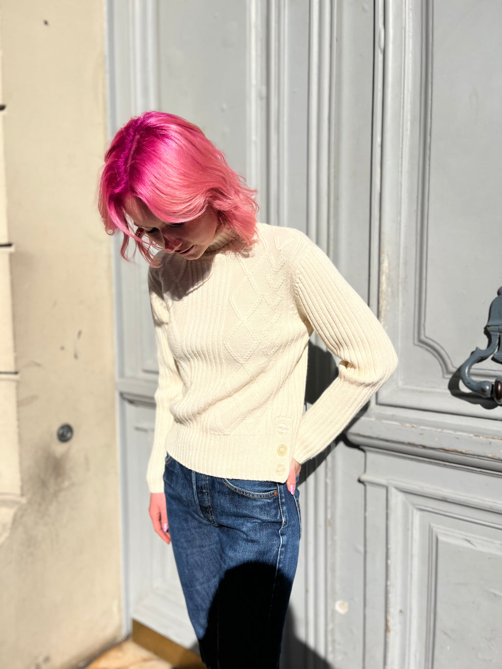 Pull écru en maille torsadée