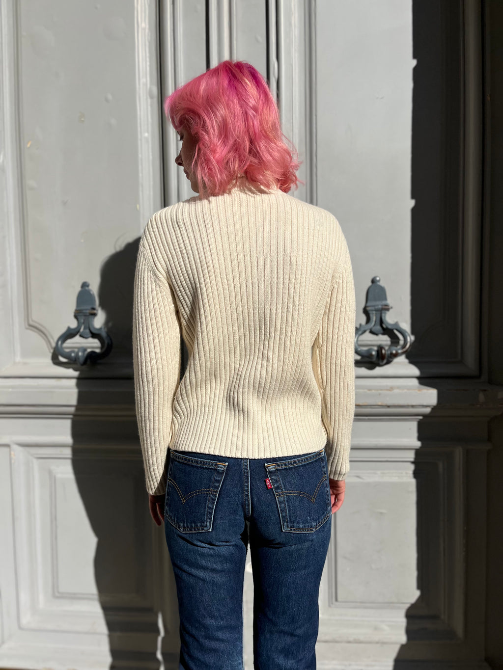 Pull écru en maille torsadée