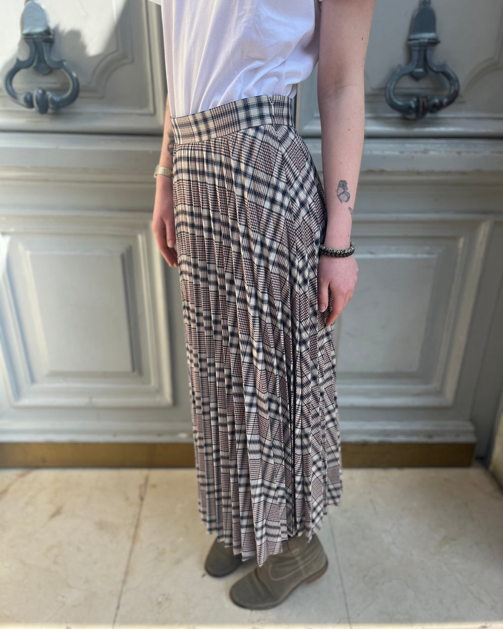 Jupe midi plissée à carreaux
