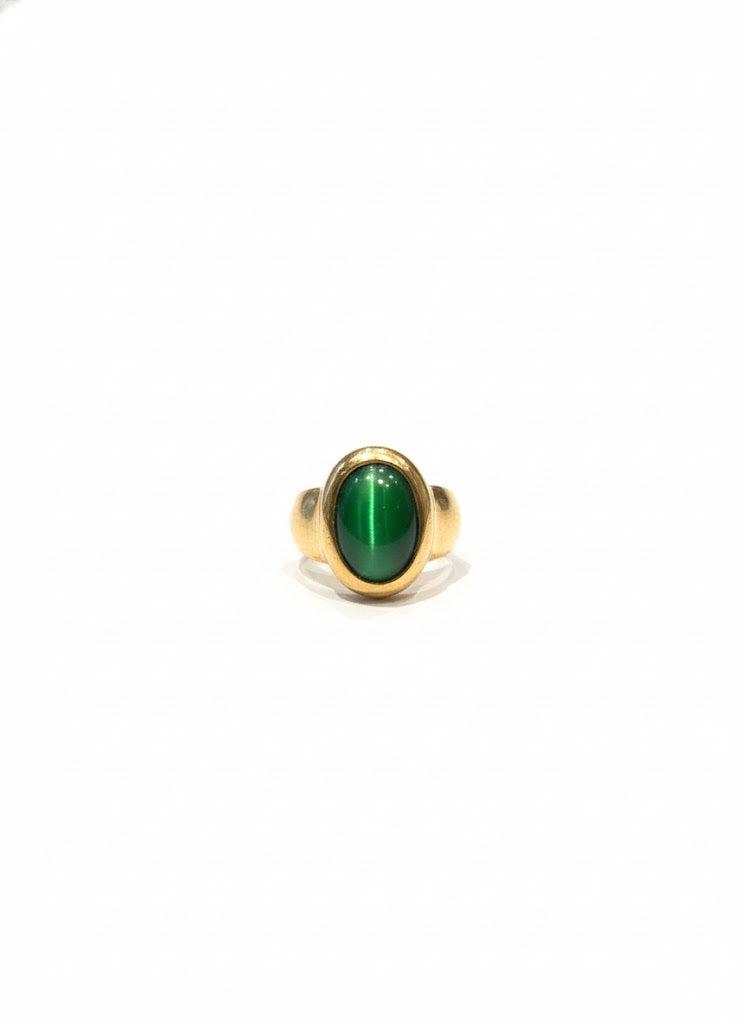 Bague dorée à pierre verte