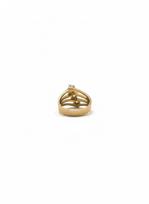 Bague dorée à trois strass