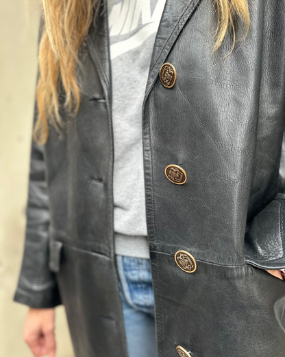 Manteau mi-long noir en cuir