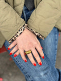 Bague bombée godronnée dorée