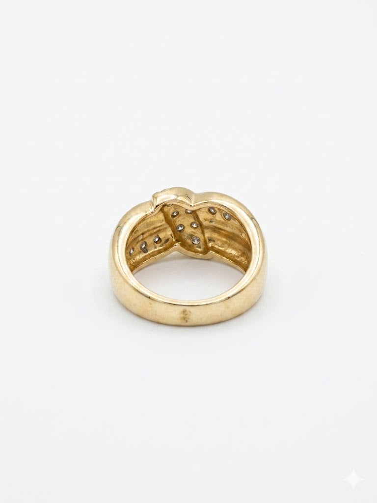 Bague vintage dorée à maillons croisés et strass