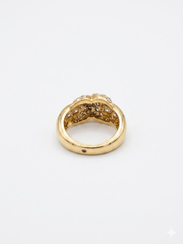 Bague vintage dorée à motif croisé et strass