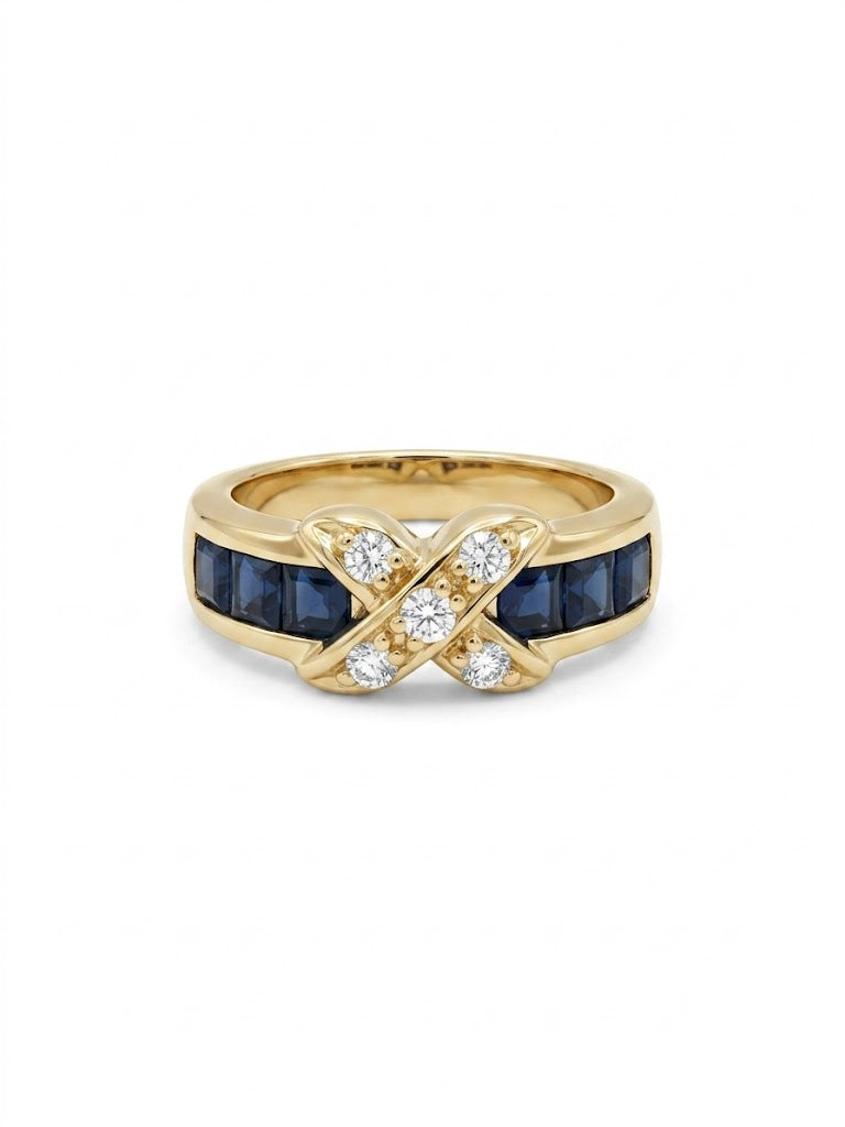 Bague vintage dorée sertie de pierres bleues et strass