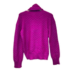 Pull rose à paillettes Chanel
