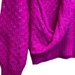 Pull rose à paillettes Chanel