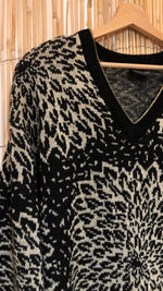 Robe pull noir à motifs